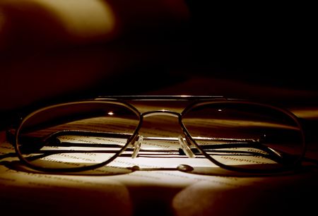 eyeglasses on the book close-up