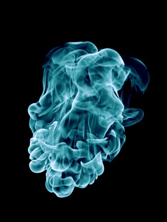 Blue fire isolated on a black background.の写真素材