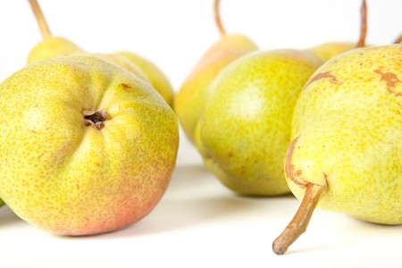 heap of fresh tasty pears on white backgroundの写真素材