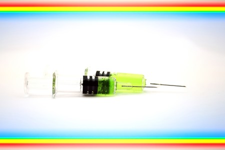 Syringes on color background.の写真素材