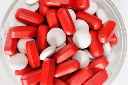 red and white pillsの写真素材