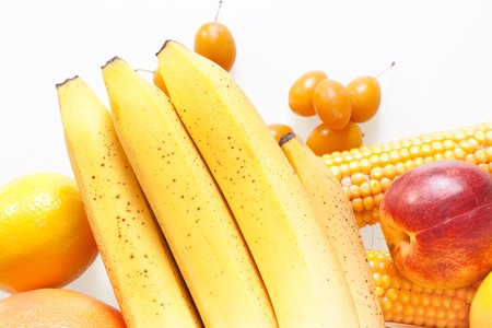 fresh vegetables and fruits isolated on white backgroundの写真素材