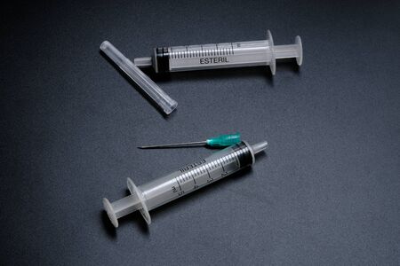 A small syringe into which a hollow, sharp-pointed bevel-cut needle is inserted and is used to...