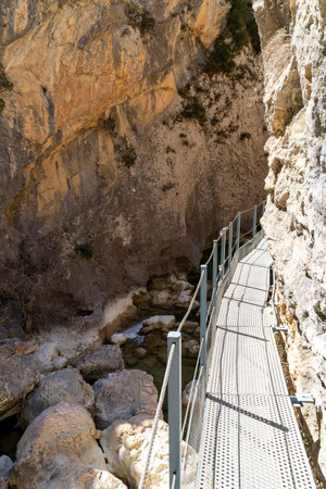 Footbridges of Alquezar on a sunny day on the Vero river, located several meters high, allow you to enjoy this part of the river.の写真素材