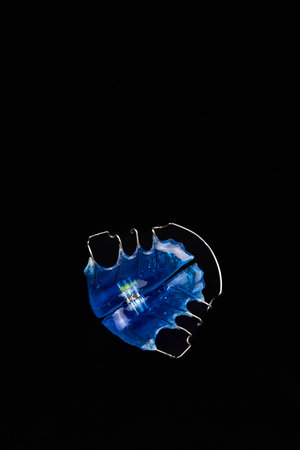 Orthodontic appliance on black backgroundの写真素材