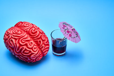 Red human brain and alcoholic beverage.の写真素材