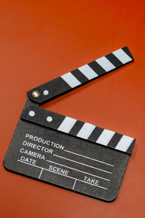 Movie Clapperboard On Orange Backdropの写真素材