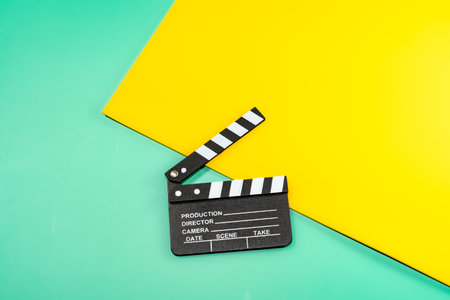 Movie Clapperboard on Colorful Backgroundの写真素材