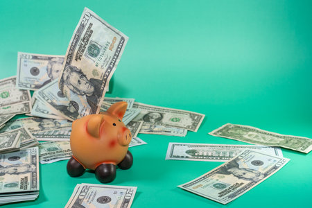 Piggy Bank Filled With American Currencyの写真素材