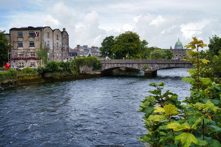 River Scene with Bridge in Galway, Irelandの写真素材