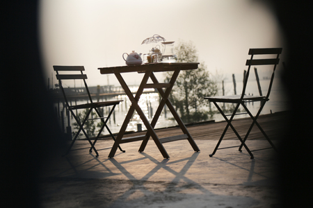 Crab Island Wooden Chairs and Table High Teaの写真素材