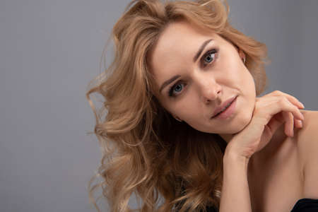 Portrait of pretty woman blonde hair, blue eyesの写真素材