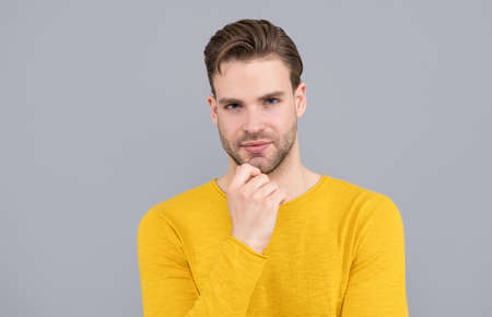Handsome dude. Handsome man portrait grey background