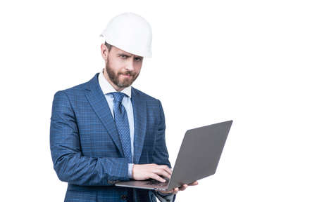 chief engineer in hardhat use computer. mature ceo checking email. serious man boss.