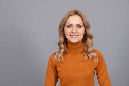 close up Portrait of pretty woman curly blonde hairの写真素材