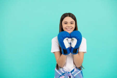 happy kid boxer in boxing gloves during sport training, copy space, sportの写真素材
