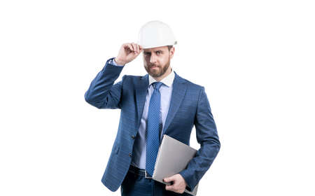 architect working on project. chief engineer in hardhat hold computer. mature ceo manの写真素材