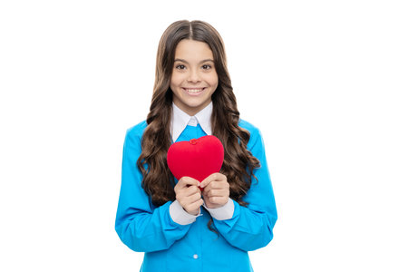 Your heart matters. Happy child hold red heart. Cardiac disease. Pediatric careの写真素材