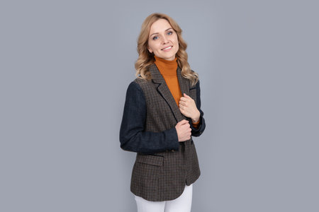 female beauty and fashion. business casual style. girl in british jacket. british fashion style.の写真素材