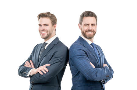 two happy business leaders in suit cross hands isolated on white, leadershipの写真素材