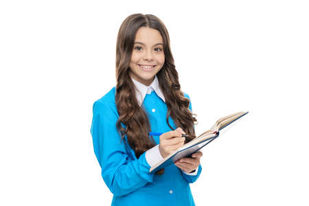 Get education. Happy child do homework in writing. School education. English lessonの写真素材