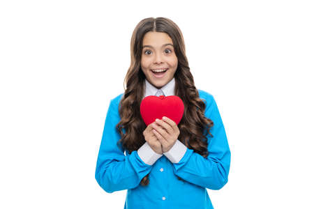 Happy girl hold red heart love symbol for valentines day celebration isolated on white, 14 februaryの写真素材