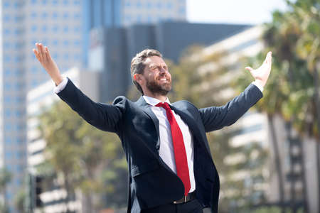 man feel freedom. professional bearded ceo celebrating success. mature businessmanの写真素材