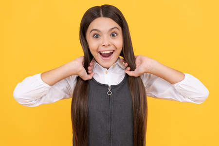 Be great every day. Surprised girl hold long hair. Hair education. Beauty schoolの写真素材