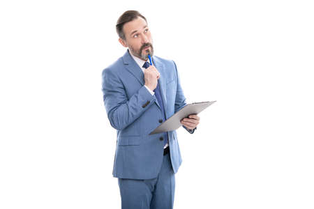 thoughtful entrepreneur making notes on folder documents isolated on white, decision.の写真素材
