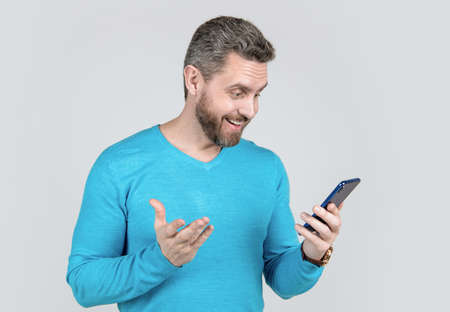 surprised man chat online. sms and instant messaging. agile business blogging.の写真素材