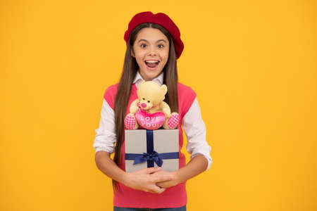 amazed child has birthday. teenage beauty go shopping. tween and youth. purchase a gift.の写真素材