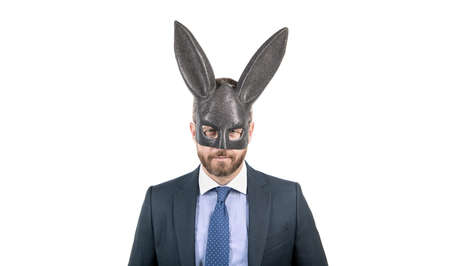 Rabbit man wear sexy bdsm fetish mask in formalwear isolated on white, playboyの写真素材