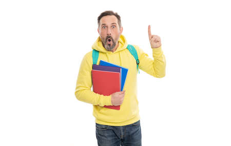 amazed man inspired with idea carry backpack hold workbook for education isolated on white, study.の写真素材