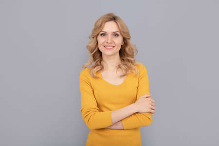 cheerful blonde beauty girl with curly hair, smooth skinの写真素材