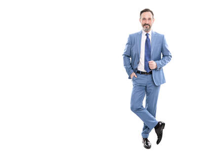 happy grizzled businessman in suit full length isolated on white copy space, business fashion.の写真素材