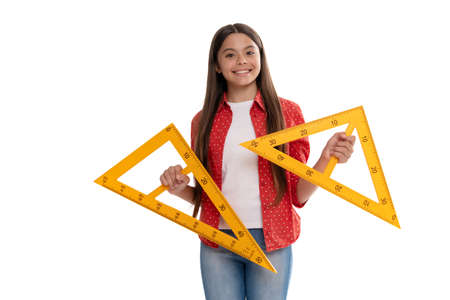 happy kid hold triangle ruler study geometry at school isolated on white, schoolの写真素材
