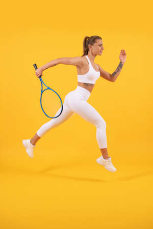dedicated to fitness. tennis or badminton player training. healthy and active lifestyle.の写真素材