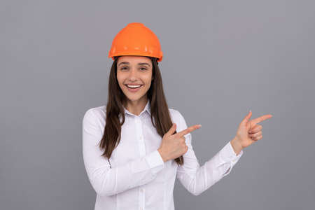 female construction worker. businesswoman in builder hardhat. chief architect engineerの写真素材