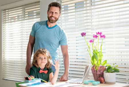 education concept. homeschooling and help. back to school. parenthood.の写真素材