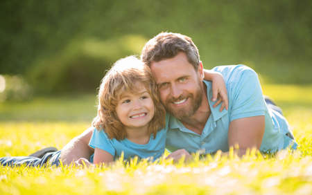 dad with kid on summer day. parenting and fatherhood. fathers day.の写真素材