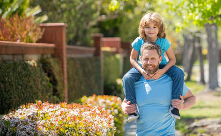 fathers day. happy father and son having fun outside. family value. childhood and parenthoodの写真素材