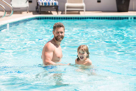 daddy with kid boy on spa resort. summer holidays weekend at family day.