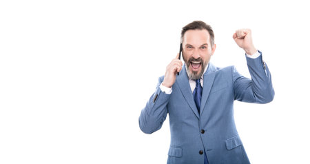 happy grizzled business man in suit speaking on phone isolated on white copy space, business successの写真素材
