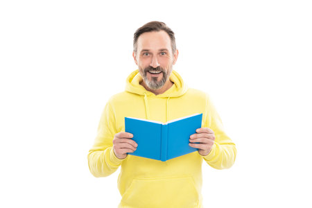 handsome mature man hold book or notebook for education and reading isolated on white, literature.の写真素材