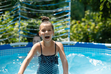 Chilling in summer. Happy child enjoy chilling in pool. Chill pool day. Summer vacation