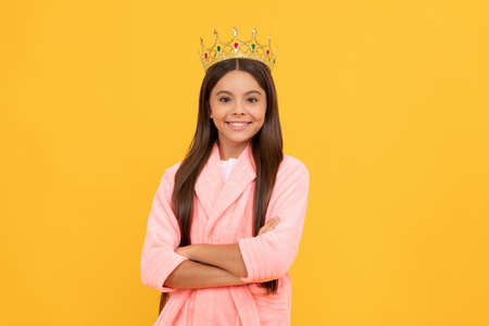 good morning. princess beauty. selfish kid wear diadem. queen child in cozy sleepwearの写真素材