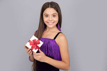 We wrap good wishes. Birthday girl hold present box. Wrapped box or package. Gift shopの写真素材