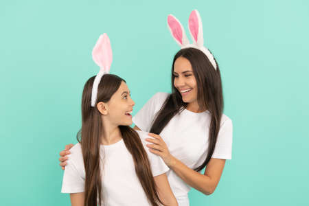 happy easter family of mother and daughter in bunny ears, easterの写真素材