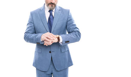 male fashion accessory. ceo man in suit checking time. cropped businessman with hand watchの写真素材