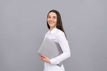 network administrator hold computer. office manager in white shirt. concept of agile business.の写真素材